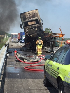 ER-0025
Photo Date: 05-24-16
Photo Credit: Scott Wagner, NE Chapter, Whitley County Health Department
Description: This is the scene of a semi accident that I came across and participated in helping to remove the driver from the lower semi. Twelve men in all were awarded for their heroic actions in the process.

*2016 Photo Contest Winner for Terrorism & All-Hazards Preparedness category
