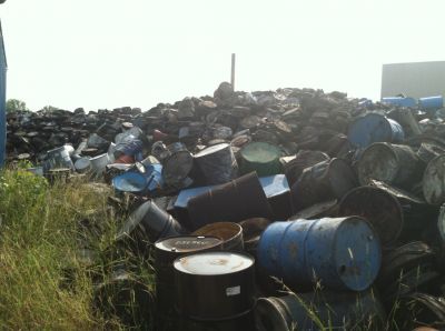 SHW-0011
Photo Date: 09/20/2013
Photo Credit: Eric Kaufman
Description: Massive pile of crushed steel drums that once contained hazardous waste waiting to be shredded at a recycling facility.
