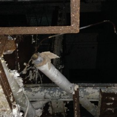 AQ-0005
Photo Date: 09/09/2015
Photo Credit: Christine Stinson
Description: This is asbestos containing material (ACM) pipe wrap at an old abandoned building in South Bend.  

