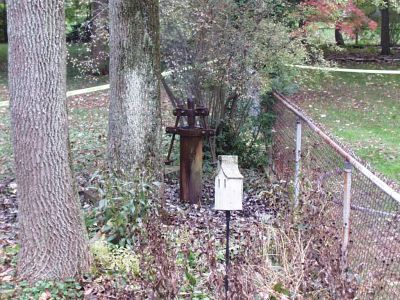 ER-0011
Photo Date: 10/22/2005
Photo Credit: Jason Ravenscroft
Description: Orphaned oil or gas well found in the backyard of a residence in Indianapolis.  The homeowners were unaware of the nature of the well which began releasing methane gas.  IDNR was able to abandon the well for the homeowners.

