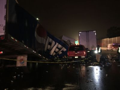 ER-0031
Photo Date:11/19/2018
Photo Credit: Kyle Fender
Description: 4 vehicle accident occurred involving a pickup truck, two semis, and a private mail truck. The vehicles spilled vehicle fluids on the roadway and one of semi trailers lost several cans of Pepsi products on the roadway.
