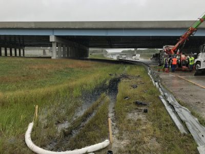 ER-0033
Photo Date:8/26/2019
Photo Credit: Kyle Fender
Description: A semi jackknifed into a guardrail and drove off the road spilling at least 70+ gallons of diesel fuel into the soil along the interstate
