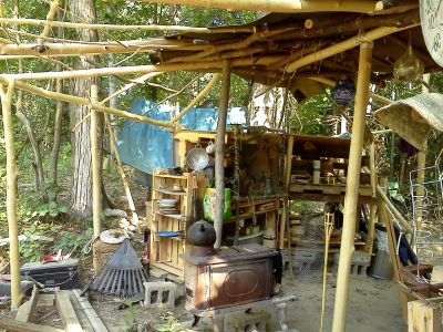 FS-0042A
Photo Date:	6/2015
Photo Credit:	Jennifer Heller
Description:	This was a “kitchen” in the woods that a local entrepreneur was using to process produce for sale to a Bloomington grocery.  There are three photos in the series…

*2018 Photo Contest Winner for Food Safety category
