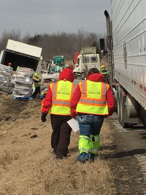 FS-0047
Photo Date: 3/4/19
Photo Credit: Sharon Pattee
Description: Heath Department workers responding to food semi accident on Indiana toll road. 
