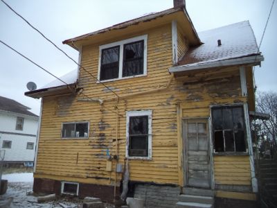 HH-0009
Photo Date: 02/14/2014
Photo Credit: Unknown
Description: Peeling Paint on House. 
