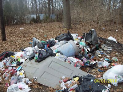 HH-0012
Photo Date: 4/1/2014
Photo Credit: Patty Nocek
Description: Trash pile in backyard.
