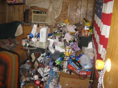 HH-0032
Photo Date:	2018 
Photo Credit:	Steuben Co Health Dept 
Description:	
Housing Complaint …. If you look close you can see several containers of humane waste. 

*2018 Photo Contest Winner for General Environmental Health Category
