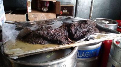 FS-0004a
Photo Date: 02/11/2015
Photo Credit: JoAnn Xiong-Mercado
Description: Cooked smoked brisket cooling in the walk in cooler with plastic wrap, improper cooling method
