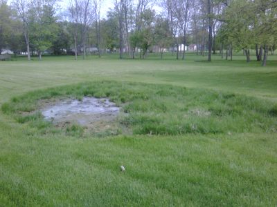 OWS-0003
Photo Date: 5/6/2011
Photo Credit: Jason Ravenscroft
Description: Sewage ponding over the septic field of a residential onsite system.

