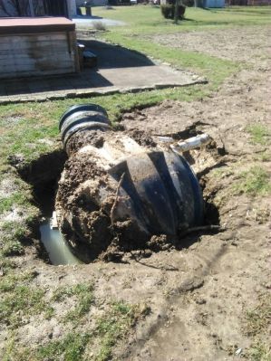 OWS-0024b
Photo Date:	March 2, 2018
Photo Credit:	Brad Rode
Description:	Dosing tank pushed out of ground by high water table

