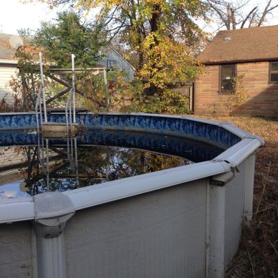 POOL-0026
Photo Date:	11/4/15
Photo Credit:	Jason Ravenscroft
Description:	Residential above-ground pool at abandoned home.

