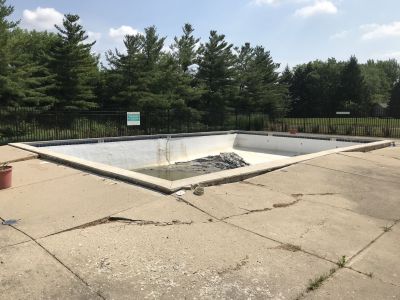 POOL-0031
Photo Date:	June 19, 2018
Photo Credit:	Jason Ravenscroft
Description:	Pool that ‘floated’ out of the ground due to hydrostatic pressure.
