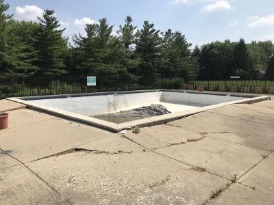 POOL-0031
Photo Date:	June 19, 2018
Photo Credit:	Jason Ravenscroft
Description:	Pool that ‘floated’ out of the ground due to hydrostatic pressure.
