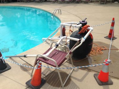 POOL-0034
Photo Date:	August 14, 2015
Photo Credit:	Jason Ravenscroft
Description:	Pool with makeshift pump and filter set up.
