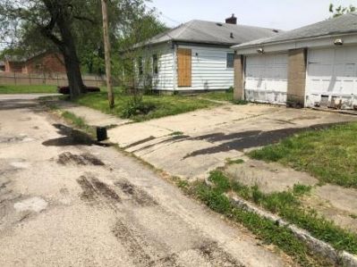 SHW-0020
Photo Date: 05/16/2019
Photo Credit: Kyle Fender
Description: Abandoned container of oil at a residential property. The container was reportedly knocked over by a property maintenance person on a lawn mower, and tumbled down the driveway, and into the street, spilling oil as it rolled down.
