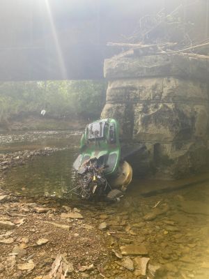 SW-0014
Photo Date: July 25, 2021
Photo Credit: Simeon Baker
Description: Lawn mower washed downstream after flood event. 
