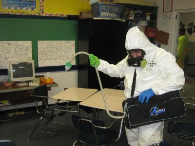 ER-0027
Photo Date: January 1, 2010
Photo Credit: Ron Clark
Description: EPA contractor monitoring for mercury in a classroom after a student brought a bottle of mercury to school and spilled it in the lockers and classroom.
