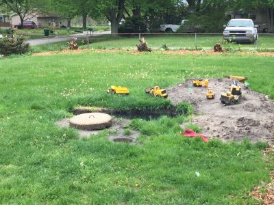 OWS-0015
Photo Date: May 2017
Photo Credit: Ken Johnston
Description: Failed septic with toy trucks

*2017 Photo Contest Winner for Wastewater category
